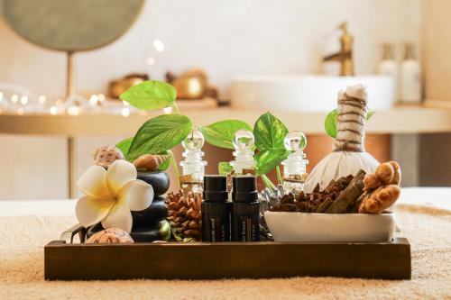 a tray with a bunch of differentiatesiatesiatesiatesiatesiatesktop at Centara Mirage Resort Mui Ne in Mui Ne