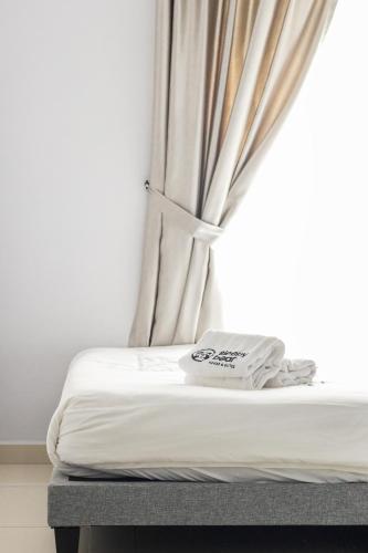 Cama o camas de una habitación en Gaia Residence, Gamuda Gardens Rawang by Sleepy Bear