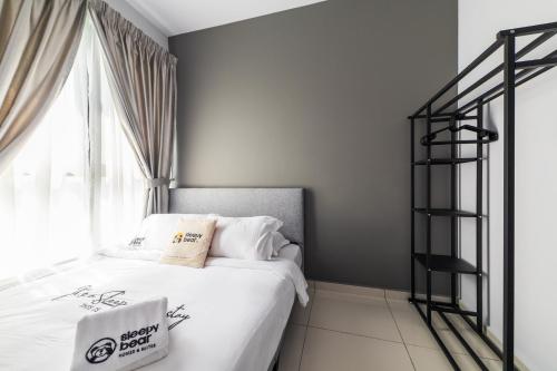 Cama o camas de una habitación en Gaia Residence, Gamuda Gardens Rawang by Sleepy Bear