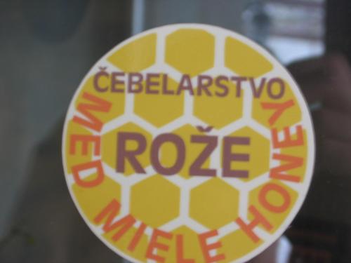 a sticker on a glass door with the wordseperrosisrosisride at Guest House Rože in Ilirska Bistrica