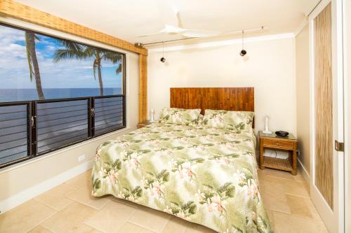 Postel nebo postele na pokoji v ubytování CASTLE Po'ipū Shores