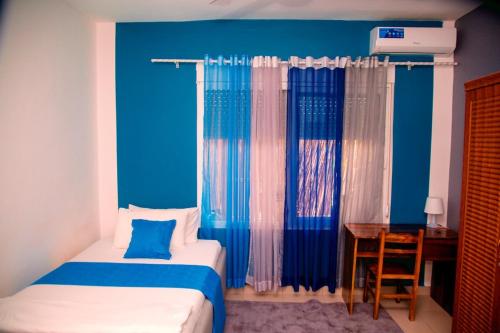 Postel nebo postele na pokoji v ubytování Two Storey Three Bedroom House