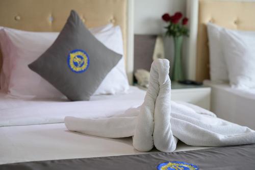 Hak Huot Hotel Iにあるベッド