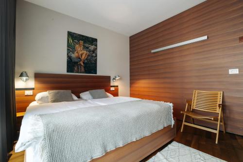 Postel nebo postele na pokoji v ubytování Hotel Rakar