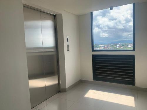 Fotografie z fotogalerie ubytování Apateu Studio Sharia - Unit lengkap, tinggal bawa koper! at Apartemen Bandaraya Tallasa City v destinaci Pacinongong