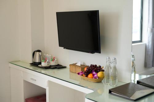 Hak Huot Hotel Iにあるテレビまたはエンターテインメントセンター