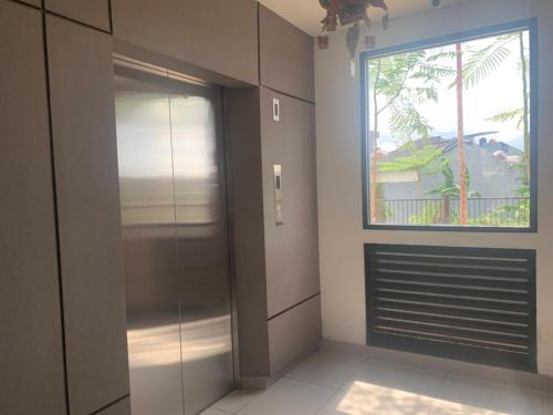 Fotografie z fotogalerie ubytování Apateu Studio Sharia - Unit lengkap, tinggal bawa koper! at Apartemen Bandaraya Tallasa City v destinaci Pacinongong
