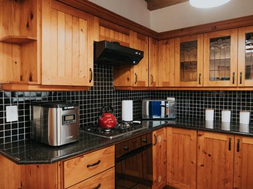 Η κουζίνα ή μικρή κουζίνα στο Fijnbosch Self-Catering Units