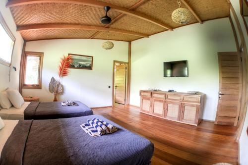 Χώρος καθιστικού στο Baha Baha Villa Sailo Hts Mentawai Hollow Trees