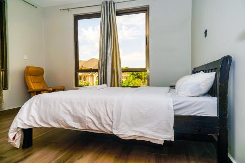 Postel nebo postele na pokoji v ubytování Runda Serene Accomodation