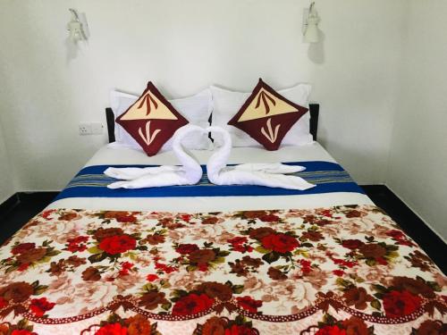 Postel nebo postele na pokoji v ubytování Oasis Ella