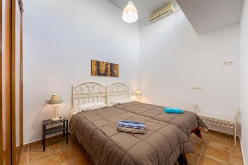 Ένα ή περισσότερα κρεβάτια σε δωμάτιο στο Casa Violeta I