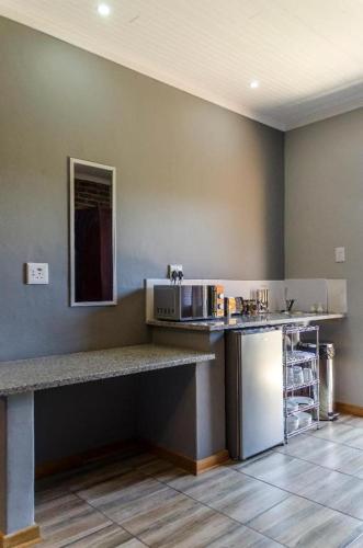 Dapur atau dapur kecil di The Woodsman Bed and Breakfast