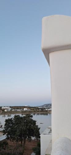 a view of a body of water from a building at Mike'sPlace in Antiparos Town