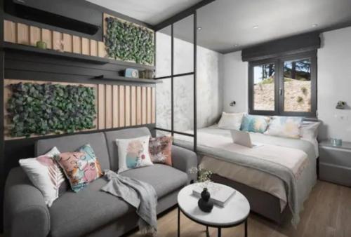 a living room with a couch and a table at NOVIGRAD Ema 2 in Novigrad Istria