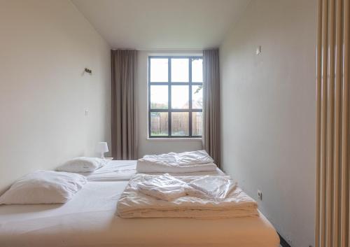 Vakantiehuis Pianthoにあるベッド