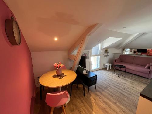 Ein Sitzbereich in der Unterkunft Maison des Fleurs T2 COSY