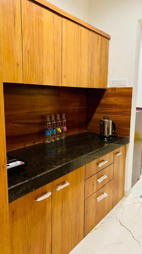 Kuchyň nebo kuchyňský kout v ubytování Stay 10 Parallel Apartment Hotel