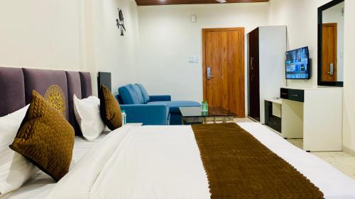 Postel nebo postele na pokoji v ubytování Stay 10 Parallel Apartment Hotel