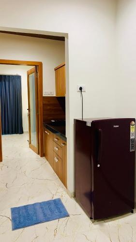 Kuchyň nebo kuchyňský kout v ubytování Stay 10 Parallel Apartment Hotel