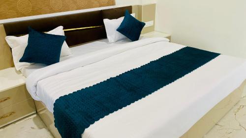 Postel nebo postele na pokoji v ubytování Stay 10 Parallel Apartment Hotel