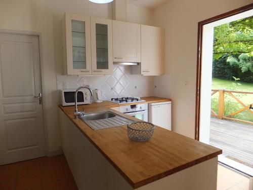 Kuchyň nebo kuchyňský kout v ubytování La Maison du Lac