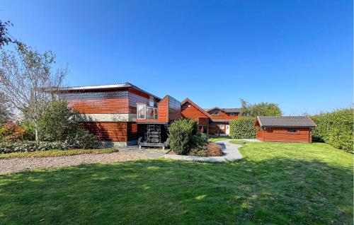 a house with a large yard in front of it at Gorgeous Home In Vanse With Sauna in Vanse