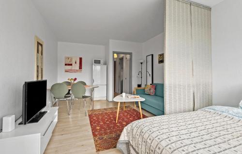 a bedroom with a bed and a living room at Nice Apartment In Esbjerg With Wifi in Esbjerg