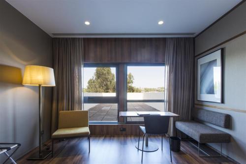 Χώρος καθιστικού στο Hotel de Guimaraes Business & SPA