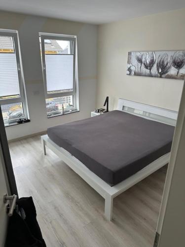 Postel nebo postele na pokoji v ubytování Gehobenes Wohnen wie zu Hause