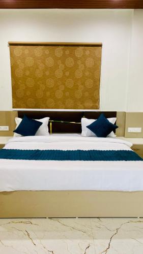 Postel nebo postele na pokoji v ubytování Stay 10 Parallel Apartment Hotel