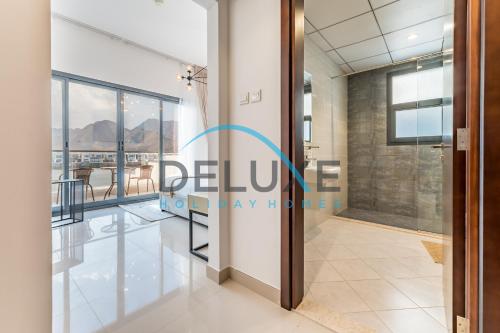 Foto sihtkohas Al-Fujayrah asuva majutusasutuse Special Rate with Temp Controlled Pool, BBQ & Maid's by Deluxe Holiday Homes galeriist