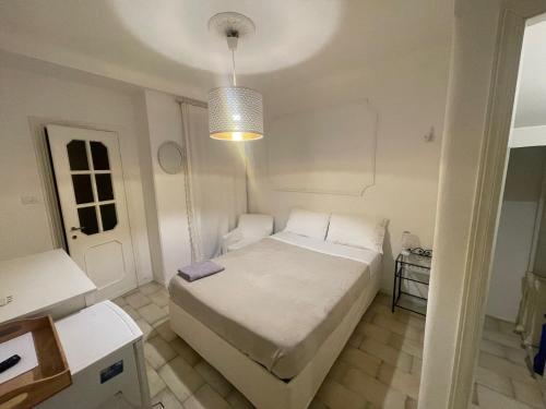 Letto o letti in una camera di Le Camere nel Borgo