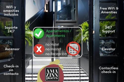 un montón de señales en el lado de un edificio en Amor de Dios 17 Boutique Apartments, en Madrid