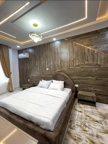 Postel nebo postele na pokoji v ubytování De-Luxe Haven Apartment