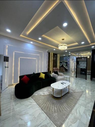 Posezení v ubytování De-Luxe Haven Apartment