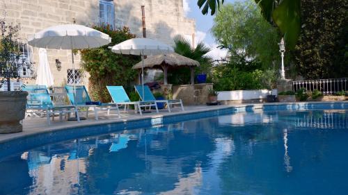 Πισίνα στο ή κοντά στο Village Knights Accommodation