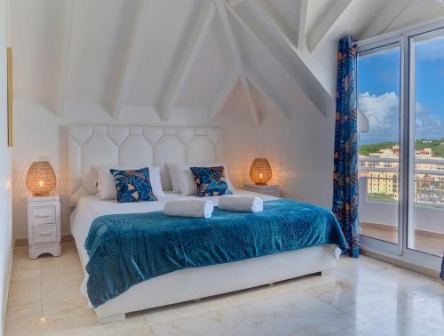 Llit o llits en una habitació de Penthouse Dominick