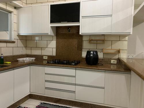 Køkken eller tekøkken på Casa em condomínio