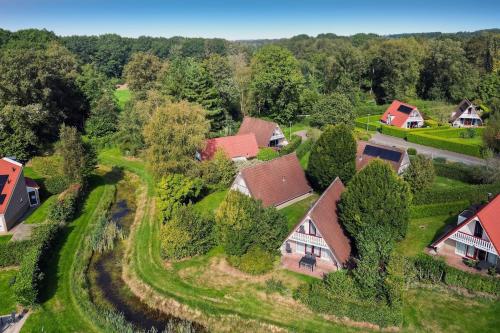 an overhead view of a village with houses and trees at Kruisbek I Chic Huisje met Riante Tuin in Zwiggelte