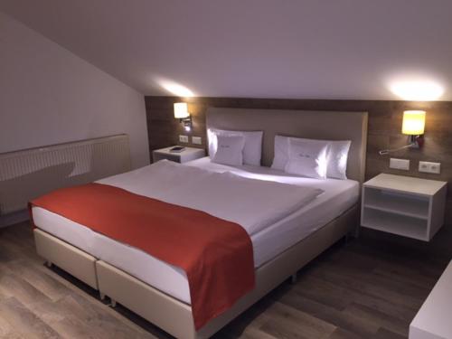 Postel nebo postele na pokoji v ubytování Pension Haus Erika