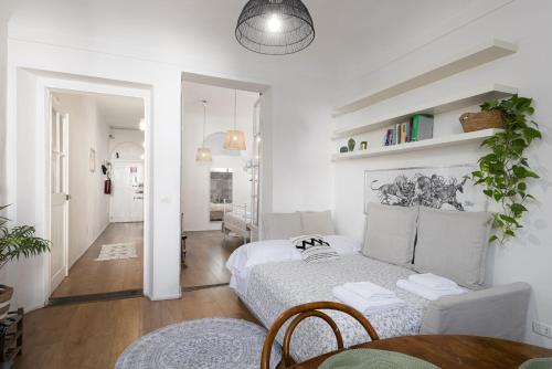 A bed or beds in a room at House of Happy Hours With TERRACE