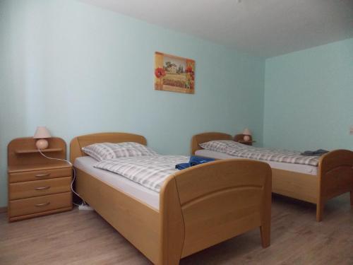 Postel nebo postele na pokoji v ubytování Ferienwohnung Heese Wennigsen