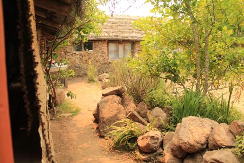 Κήπος έξω από το carpi cabaña, Tao sierras de Aigua