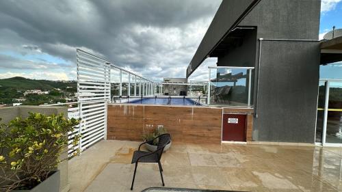 Swimmingpoolen hos eller tæt på Apartamento- Pocos de Caldas, MG