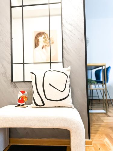 Ένα ή περισσότερα κρεβάτια σε δωμάτιο στο ORDO Apartments