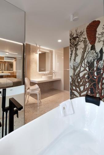 a kitchen with a white counter top in a room at Hotel Maria in Dębno Polskie