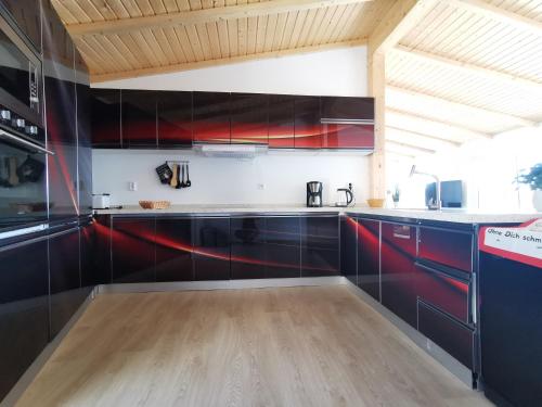 Una cocina o zona de cocina en Ferienhäuser-Klapproth