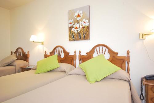 Letto o letti in una camera di Hotel Principado De Europa