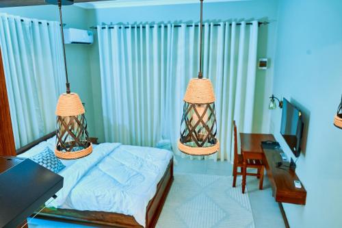 Ένα ή περισσότερα κρεβάτια σε δωμάτιο στο Birds of paradise homes 1